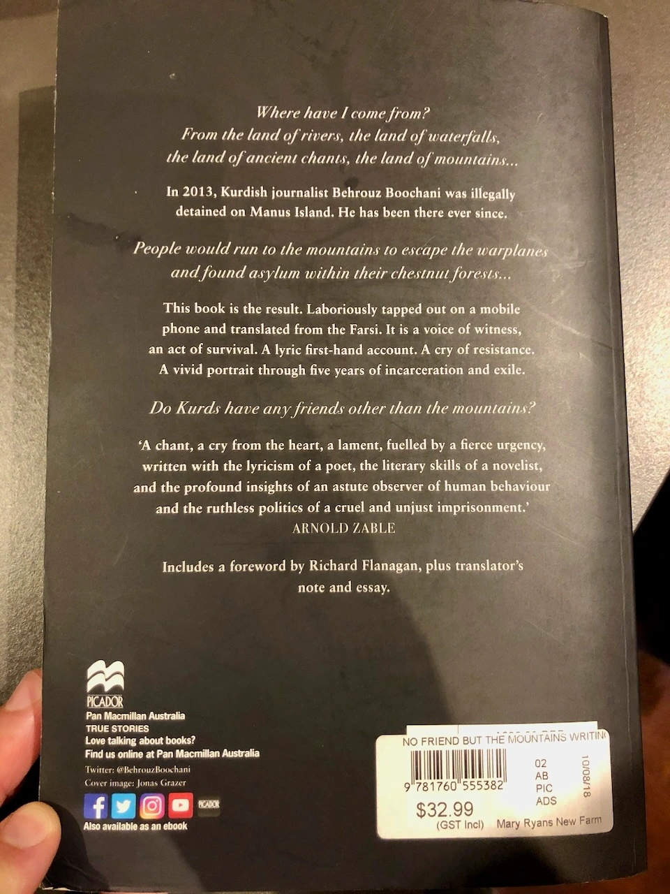 Back cover of No Friend But the Mountains