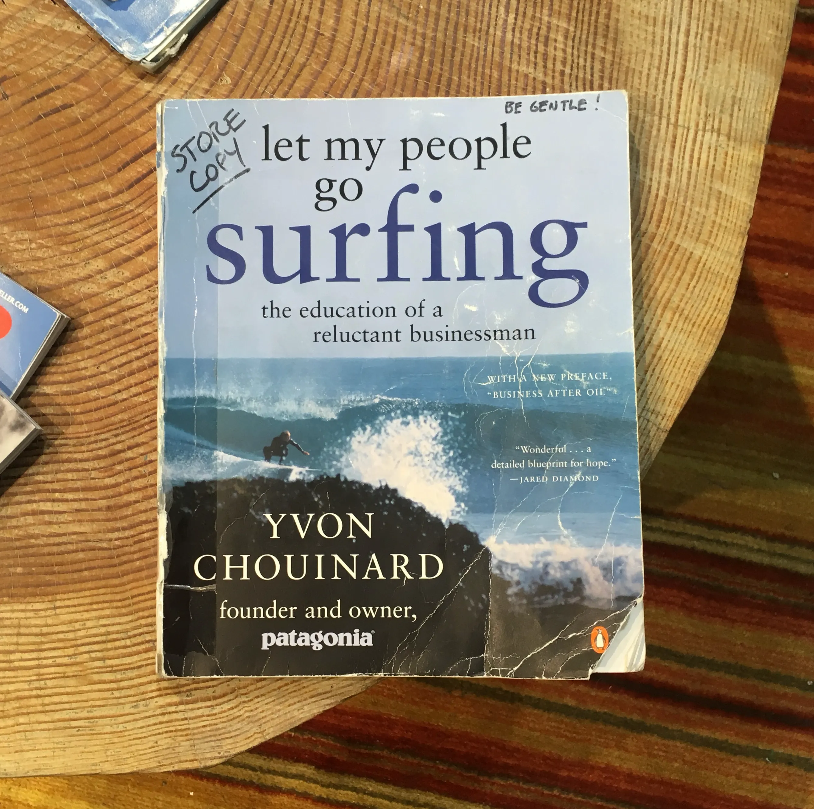 A worn store copy of Let My People Go Surfing by Yvon Chouinard